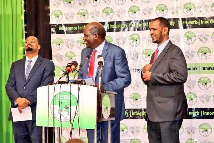 Outgoing IEBC Chair Wafula Chebukati and commissioners Boya Molu & Abdi Guliye during the launch of the Post-election Evaluation Report in Nairobi