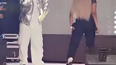 Rayvanny staring at Zuchu on stage