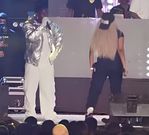 Rayvanny staring at Zuchu on stage