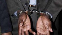 A man in handcuffs (Twitter)