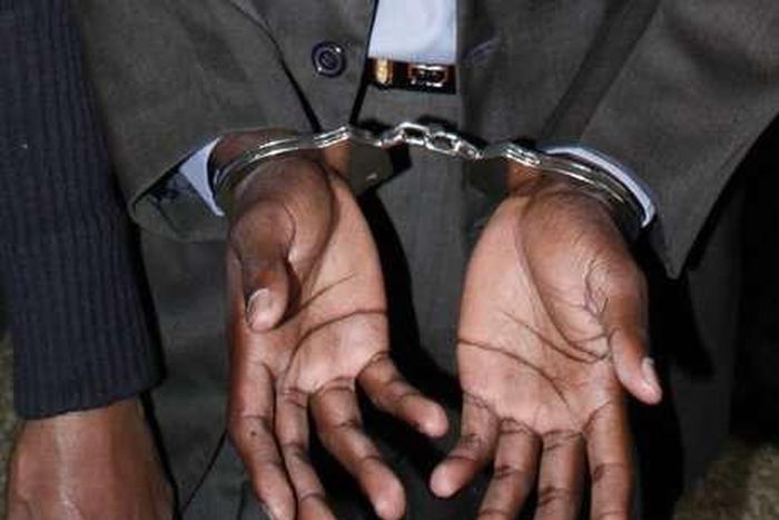 A man in handcuffs (twitter)