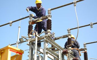A Kenya Power worker on site