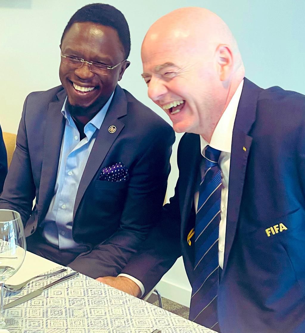 Ababu Nmwamba (left) and Gianni Infantino (right).