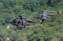 South Korean army's 500MD helicopters participating during the South Korean Defence Ministry's military drill on September 19, 2008 in Pocheon, South Korea.  (Photo by Chung Sung-Jun/Getty Images)