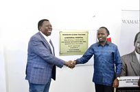 Eugene Wamalwa (left) and Trans Nzoia County Governor George Natembeya