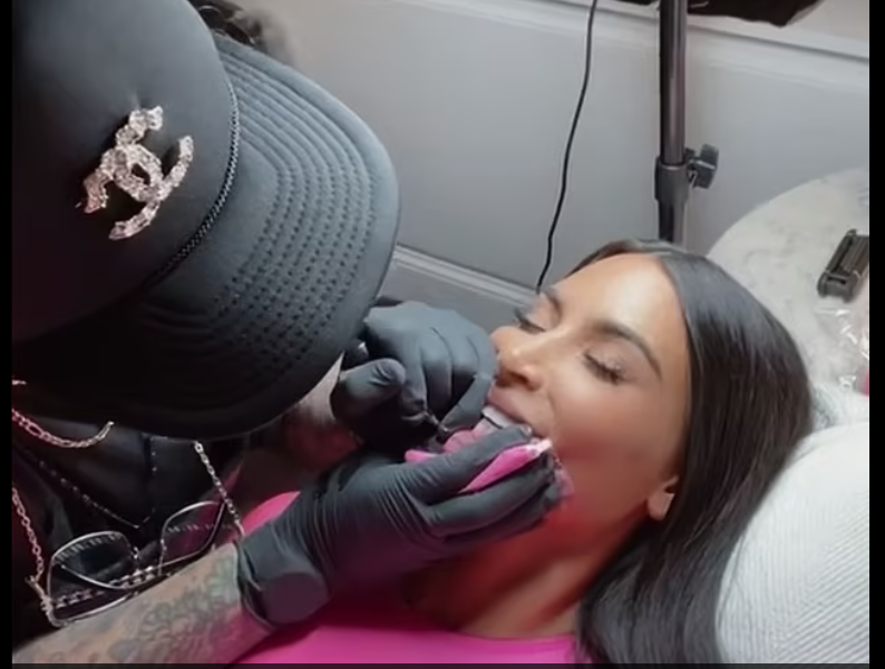 When Kim Kardashian got the tattoo done, she said it didn't hurt but her fists were comically clenched the whole time [Daily Mail]