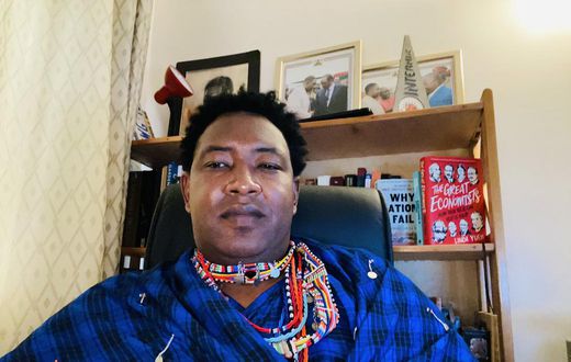 File image of Narok Senator Ledama Olekina attending a virtual Senate session in traditional attire