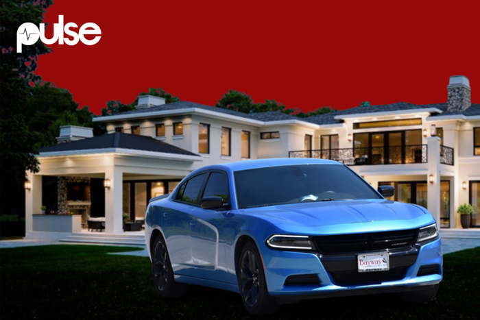 A sleek ride and a beautiful house