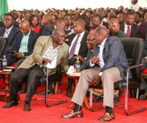 President William Ruto and his Deputy Rigathi Gachagua share a light moment with Dennis Itumbi during a thanks giving prayer service held in Kerugoya on January 22, 20223