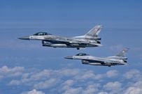 Polish F-16s take part in a NATO exercise on July 4, 2023.JOHN THYS/AFP via Getty Images