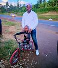 Karangu Muraya delivers bicycle to Murang'a kid, Baby Ethan