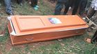 An empty coffin which was found dumped at the gate to a homestead in Kisii County on Thursday morning