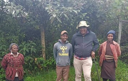 President Uhuru Kenyatta shares a moment with residents in Gatundu North