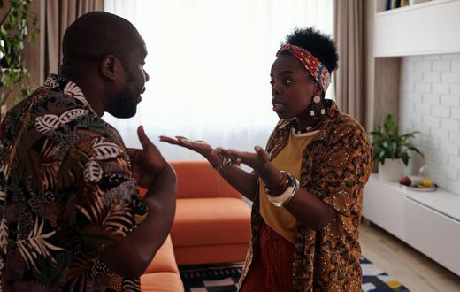 Man and woman having an argument (Photo by Diva Plavalaguna)