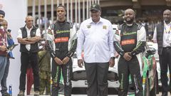32 KIMATHI McRae Kimathi(L), with his navigator Mwangi Kioni (R) pose with former president Uhuru Kenyatta during the Safari Rally Kenya held from June 23 to 26, 2022.