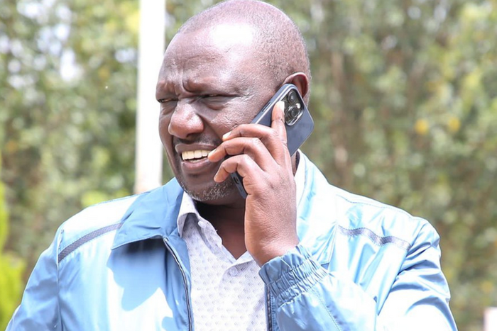File image of President William Ruto on a phone call