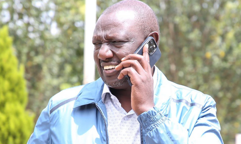 File image of President William Ruto on a phone call