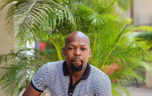 Kenyan radio presenter Alex Mwakideu