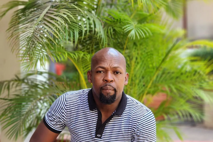 Kenyan radio presenter Alex Mwakideu