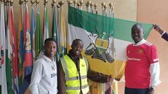 Arap Uria (in reflector) poses for a photo with Uasin Gishu County Senetor Joseph Mandago on May 30,2023.