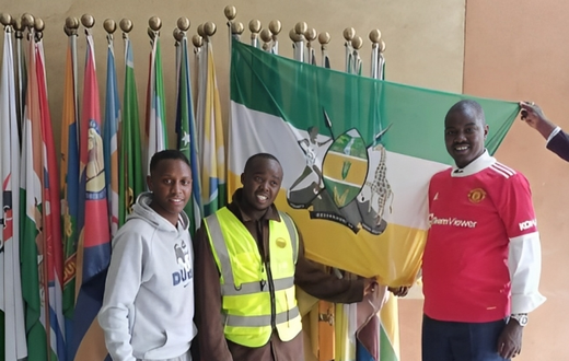Arap Uria (in reflector) poses for a photo with Uasin Gishu County Senetor Joseph Mandago on May 30,2023.
