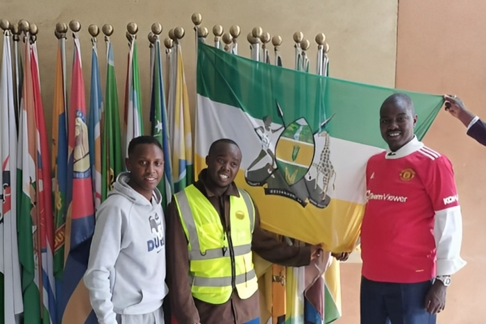 Arap Uria (in reflector) poses for a photo with Uasin Gishu County Senetor Joseph Mandago on May 30,2023.