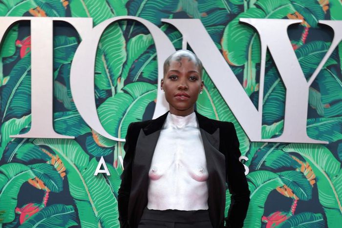 Lupita Nyong'o in her breastplate silver top