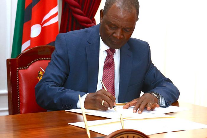 Treasury CS Njuguna Ndung'u signing a Sh400 billion loan with the AfriExim bank at State House on May 2, 2023