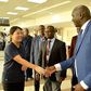Immigration PS Julius Bitok meets Ms Kyung Sang Yoo, who was among the first visa-free travellers to Kenya