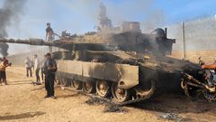 A destroyed Israeli tank in Gaza City on October 7.Hani Alshaer/Anadolu Agency via Getty Images