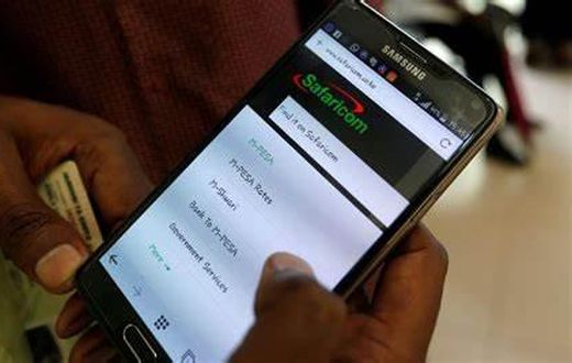 A person using M-pesa