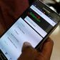 A person using M-pesa