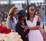 General Francis Ogolla's widow Aileen Kathambi (in black) being comforted during his memorial service