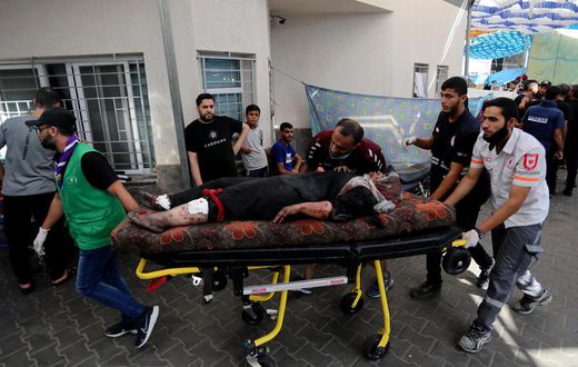 An injured Palestinian woman is wheeled into the al-Shifa hospital, following Israeli airstrikes on Gaza City, central Gaza Strip, Sunday, Nov. 5, 2023.AP Photo/Abed Khaled