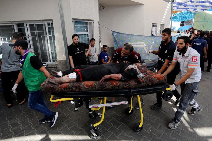 An injured Palestinian woman is wheeled into the al-Shifa hospital, following Israeli airstrikes on Gaza City, central Gaza Strip, Sunday, Nov. 5, 2023.AP Photo/Abed Khaled