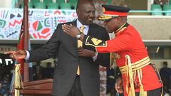 President William Ruto talks to General Robert Kibochi, Chief of the Kenya Defence Forces (KDF) during the official swearing-in ceremony, at the Moi International Sports Center Kasarani in Nairobi, on September 13, 2022.