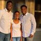 Irene Gakwa and brothers Chris and Kennedy stand in family photo