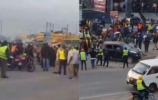 Boda boda riders and pedestrians at the scene in Kitengela where the car was stoned on Thursday
