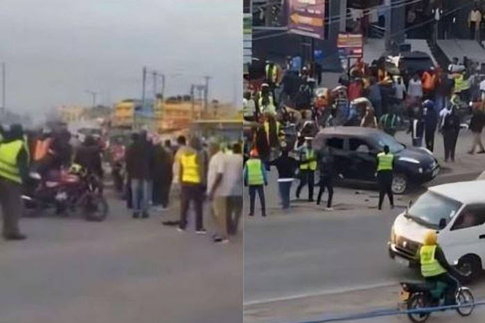 Boda boda riders and pedestrians at the scene in Kitengela where the car was stoned on Thursday