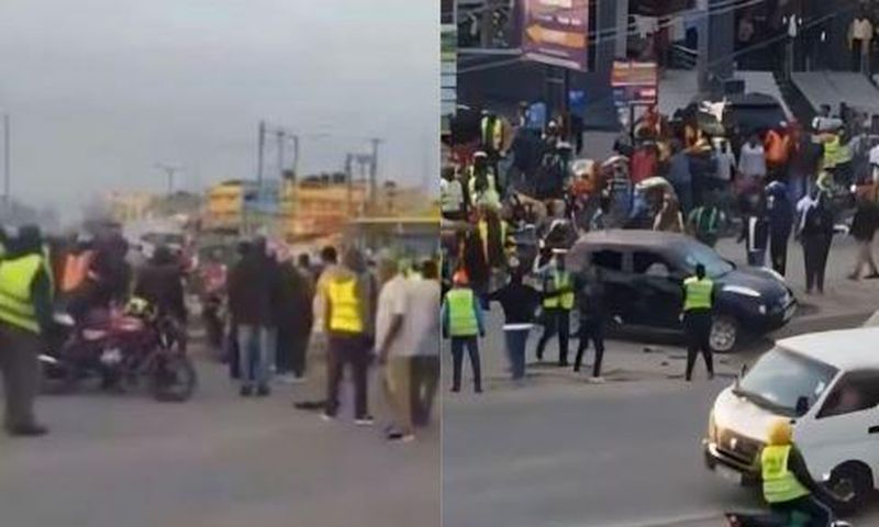 Boda boda riders and pedestrians at the scene in Kitengela where the car was stoned on Thursday