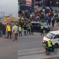 Boda boda riders and pedestrians at the scene in Kitengela where the car was stoned on Thursday