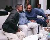 ODM leader Raila Odinga speaks with Lang'ata MP Jalang'o and former Governor Mwangi wa iria during a birthday party at Saboti MP Caleb Amisi's house