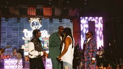 Nyashinski and Sauti Sol on stage during OkotbaFest