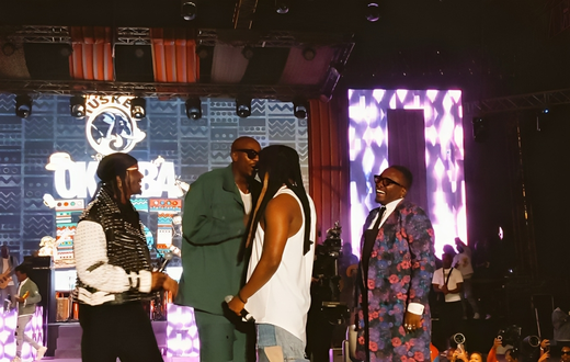 Nyashinski and Sauti Sol on stage during OkotbaFest