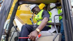 President William Ruto takes charge of a grader during the groundbreaking ceremony for affordable housing project in Thika town on Wednesday, August 9, 2023