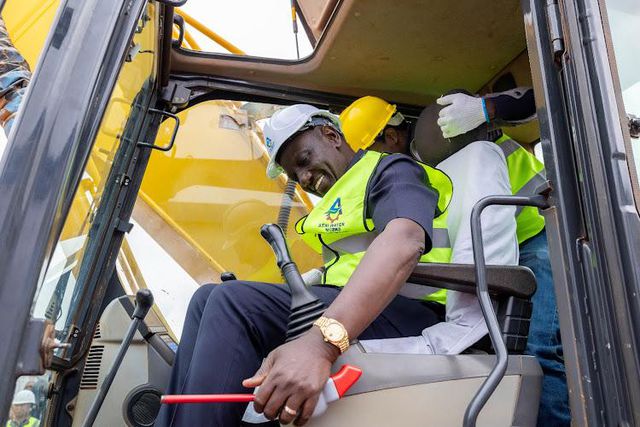 President William Ruto takes charge of a grader during the groundbreaking ceremony for affordable housing project in Thika town on Wednesday, August 9, 2023