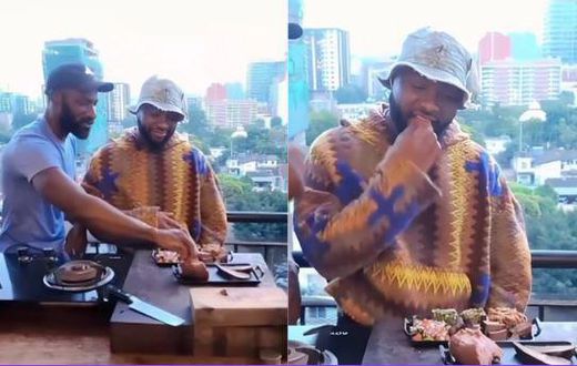 Dennis Ombachi treats Davido who is in Nairobi for Raha Fest 2024 to a sumptuous meal of ugali and omena