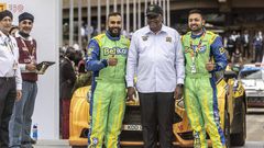 Karan Patel (R) and Tauseef Khan (L) pose for a photo with former president Uhuru Kenyattta during the Safari Rally Kenya 2022 which was held from June 23 to 26, 2022