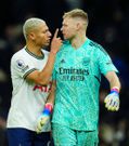 Richarlison of Tottenham Hotspur argues with Arsenal goalkeeper Aaron Ramsdale at full time after he gestured to the home fans at the final whistle Tottenham Hotspur v Arsenal on January 15, 2023.