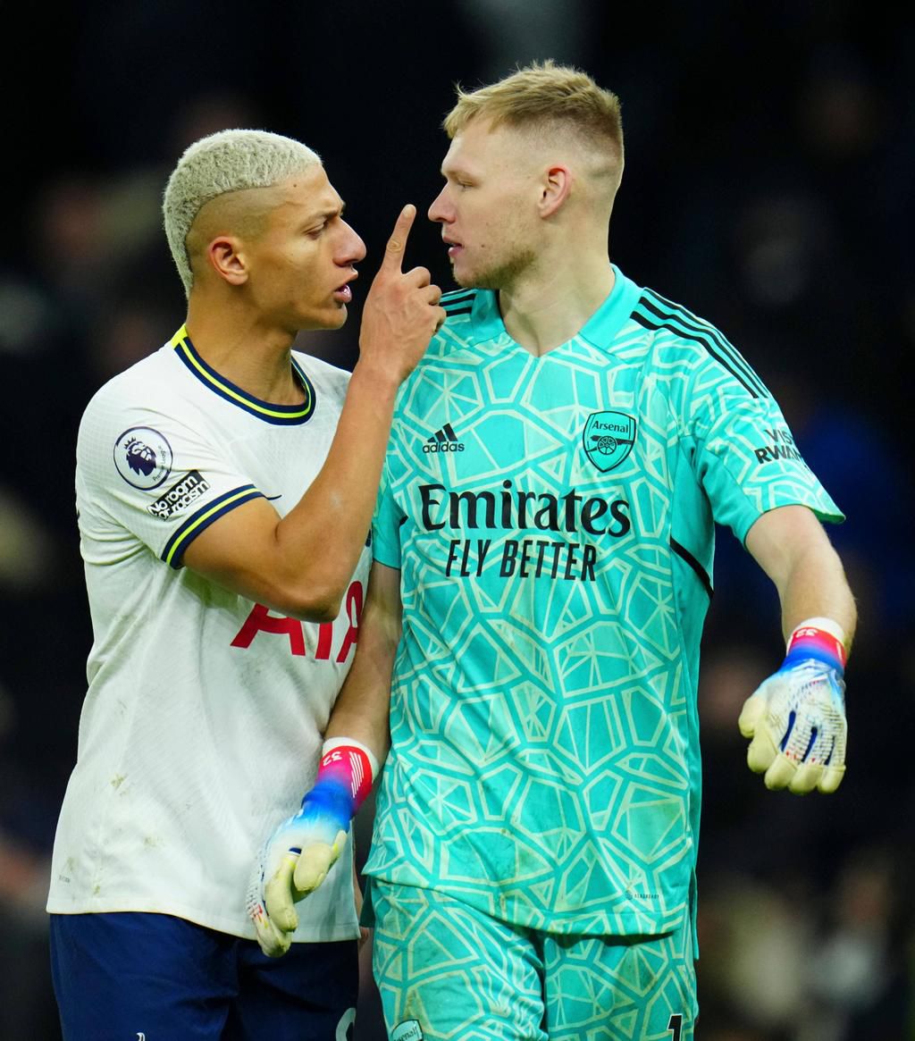 Richarlison of Tottenham Hotspur argues with Arsenal goalkeeper Aaron Ramsdale at full time after he gestured to the home fans at the final whistle Tottenham Hotspur v Arsenal on January 15, 2023.